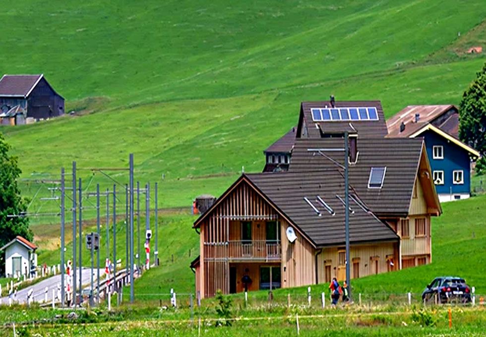 Homes on a green hillside